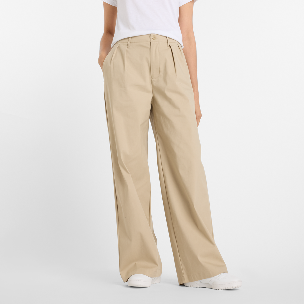 Női nadrág New Balance WP51538SOT – bézs