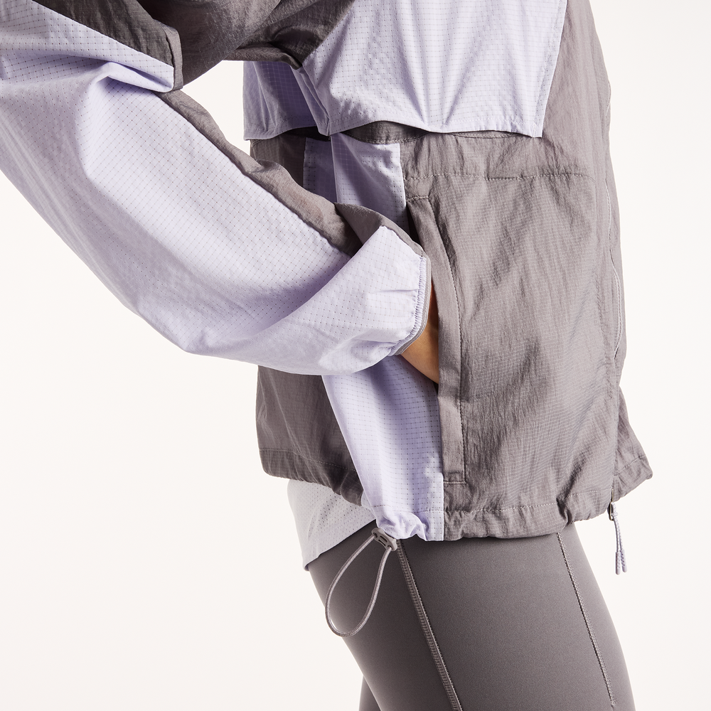 Sportdzseki New Balance Reflective RC – szürke