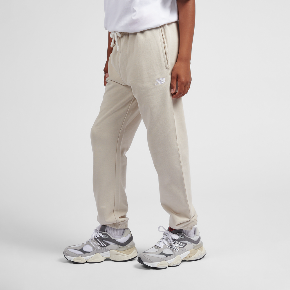 Gyerek nadrágok New Balance LAKB0060TWF – bézs