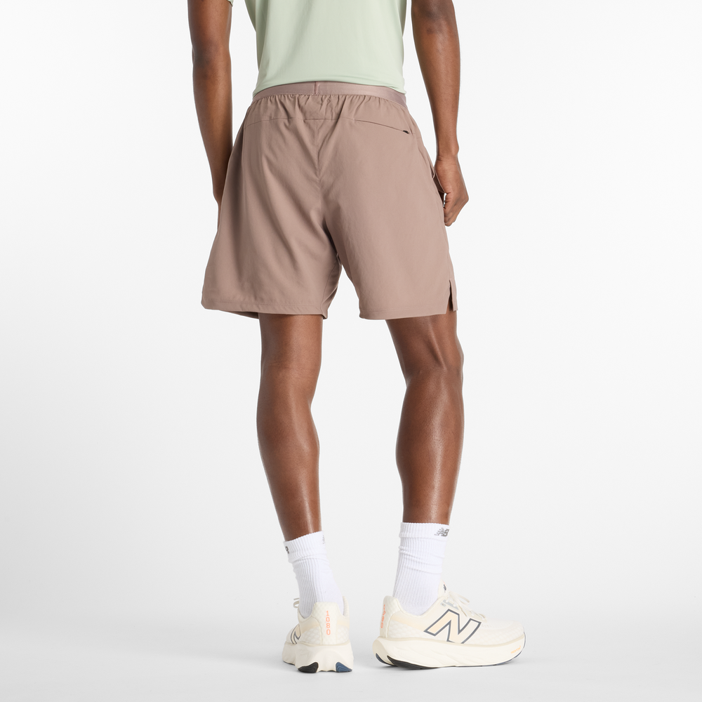 Férfi futónadrág New Balance MS41288EAS – bézs