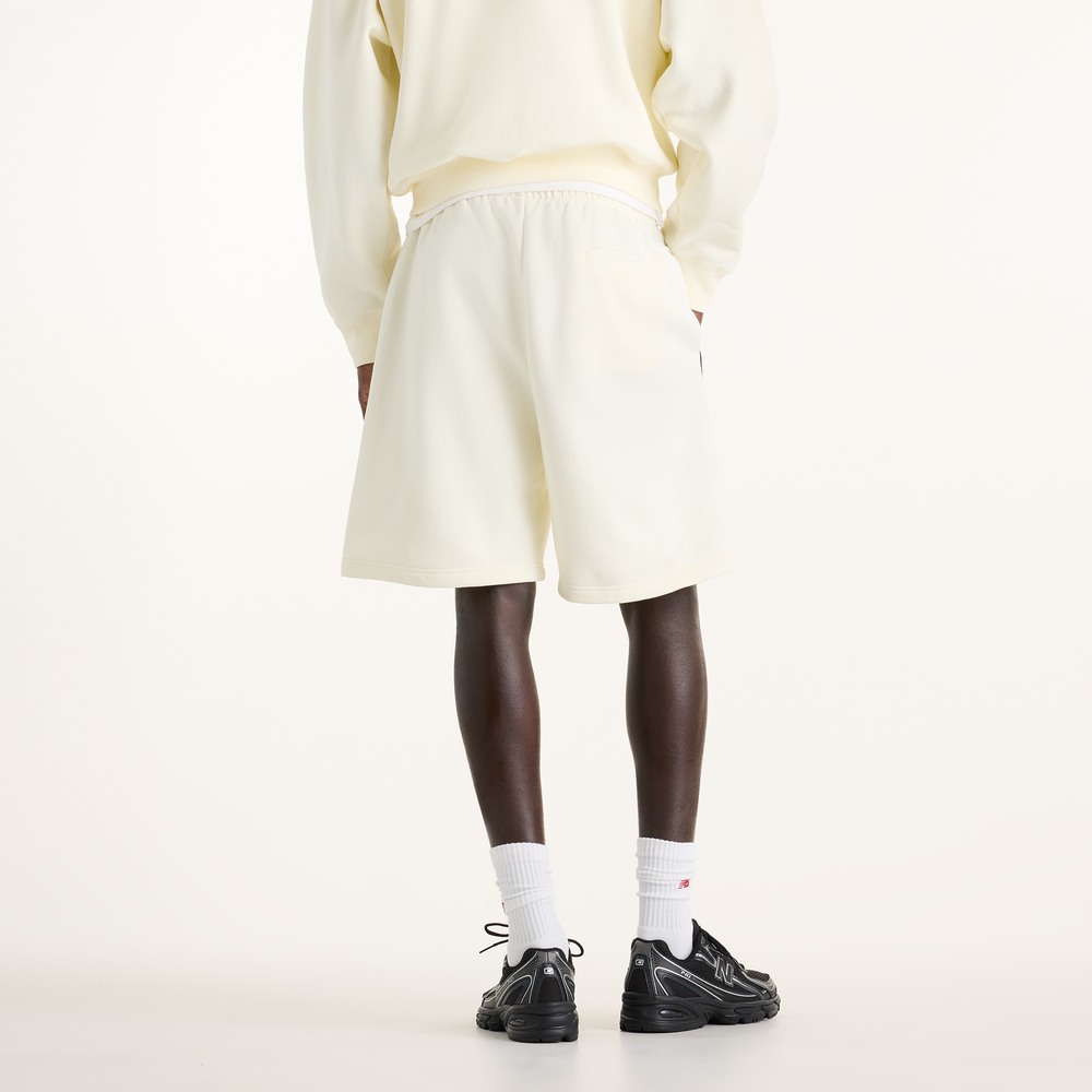 Férfi nadrág New Balance Sport Linear Graphic – bézs
