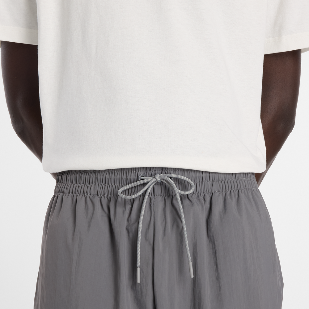 Férfi nadrág New Balance MB61R010CAS – szürke