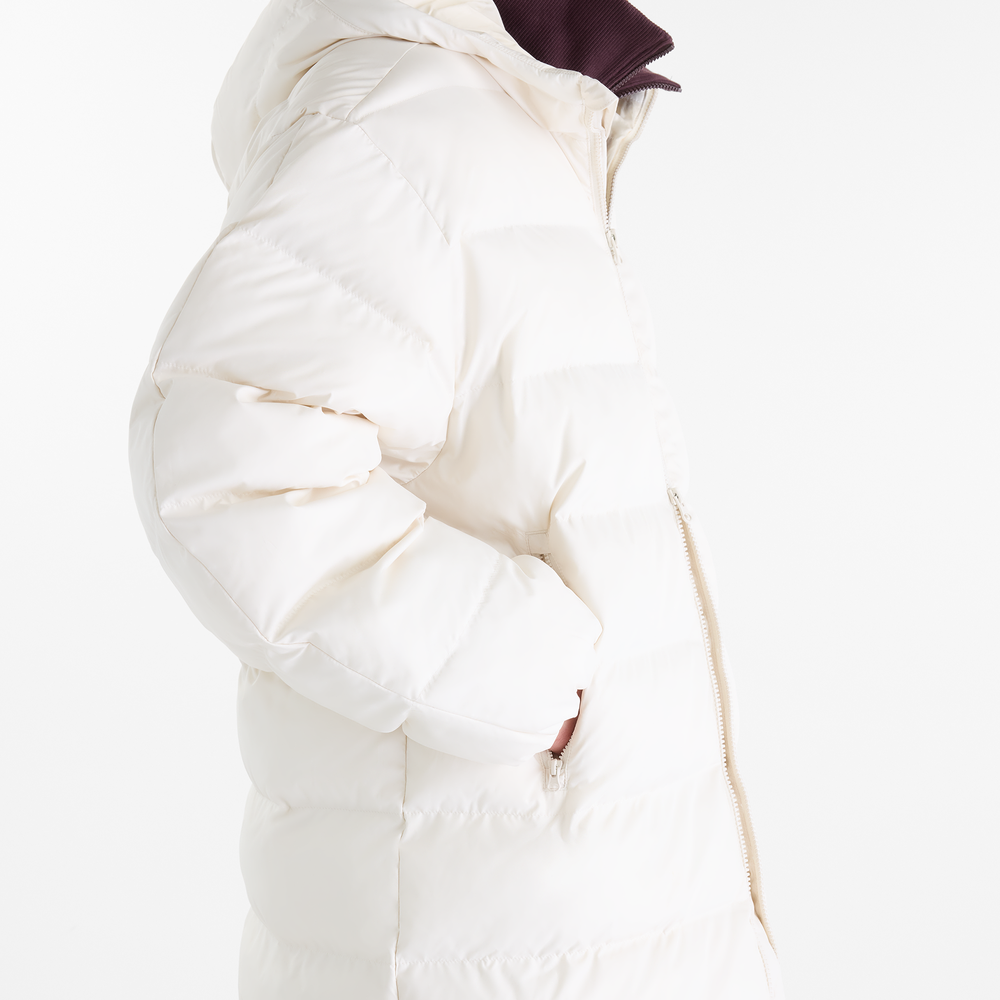 Női kabát New Balance Boston Long Puffer – bézs