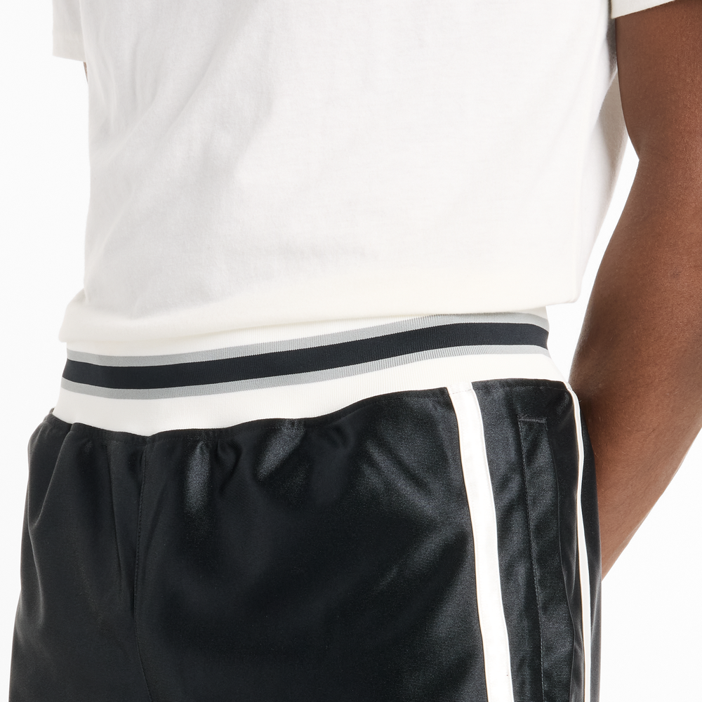 Férfi futónadrág New Balance MS51608BK – fekete