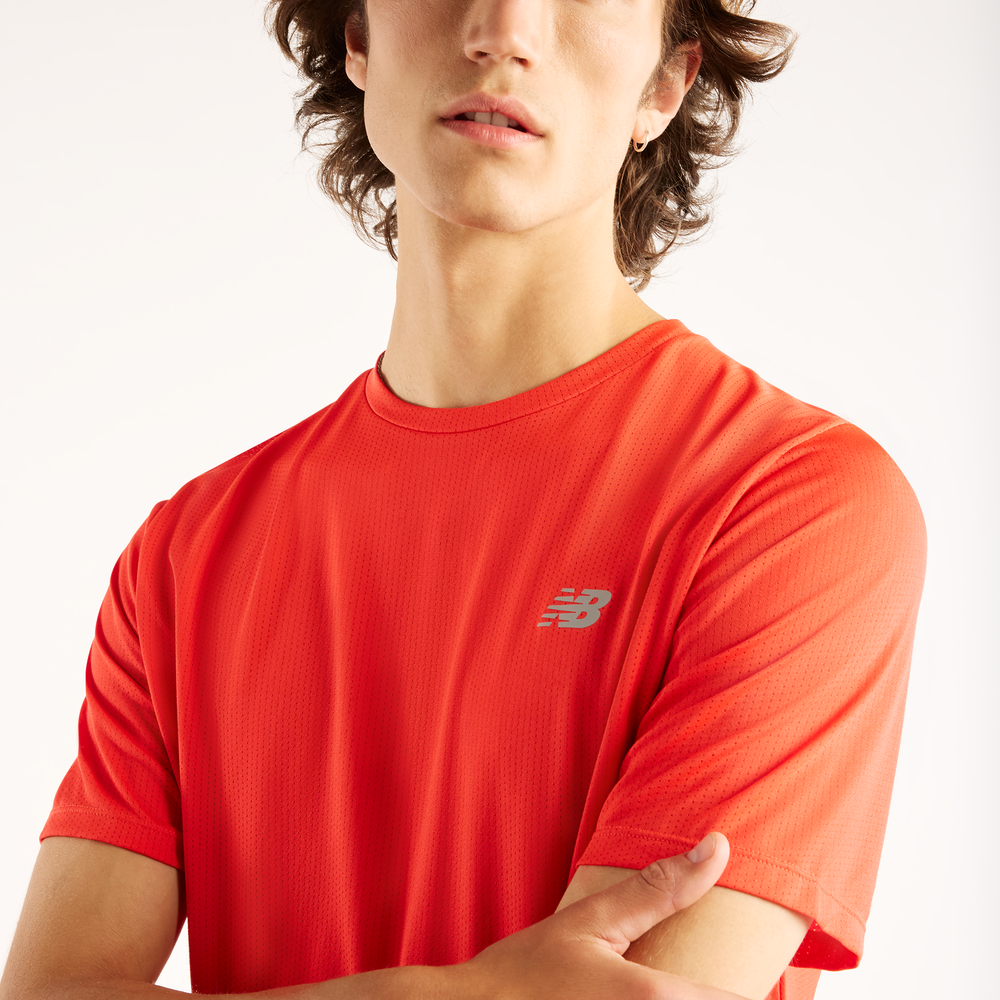 Férfi futópóló New Balance RC Essential – narancssárga