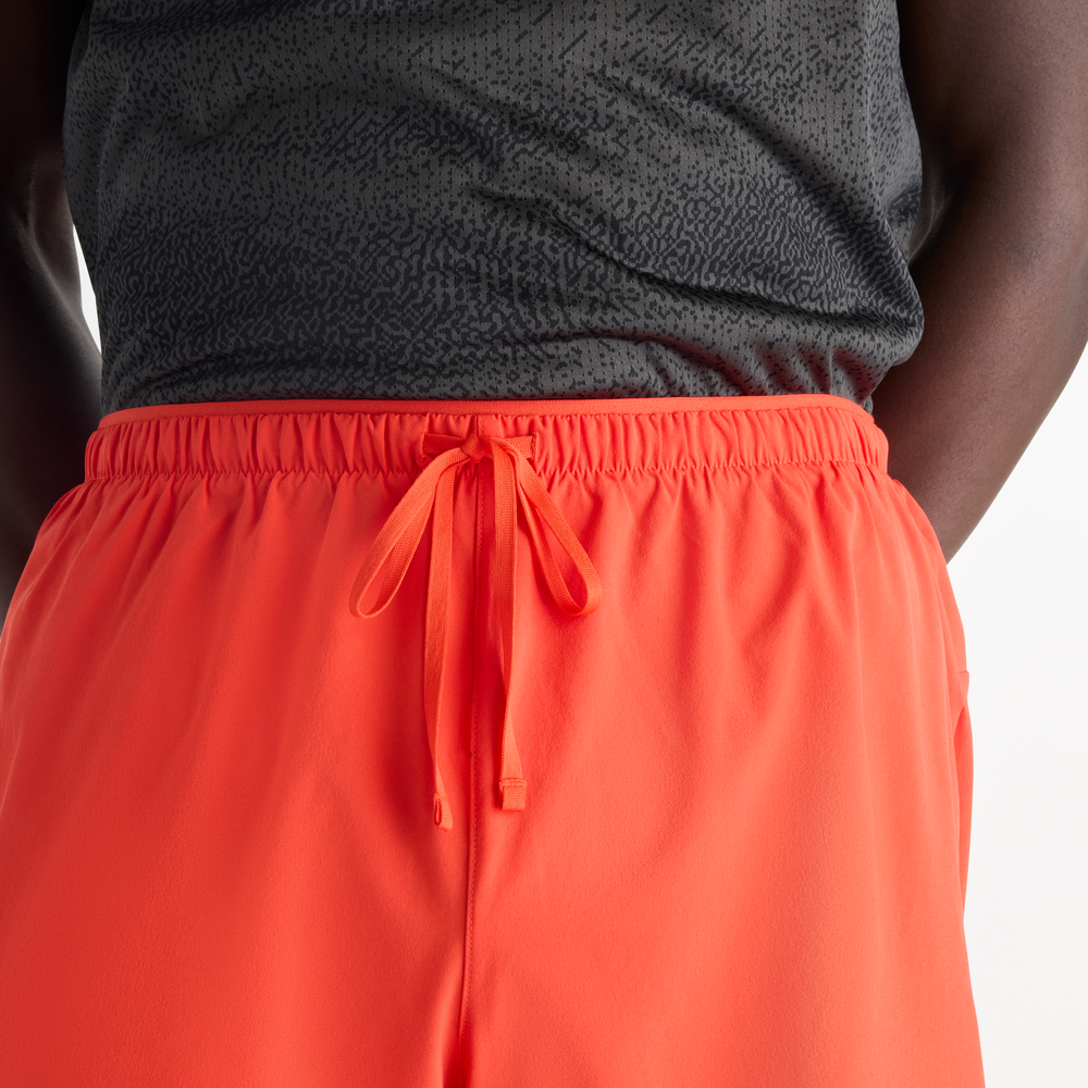 Férfi futónadrág New Balance RC Essential – narancssárga