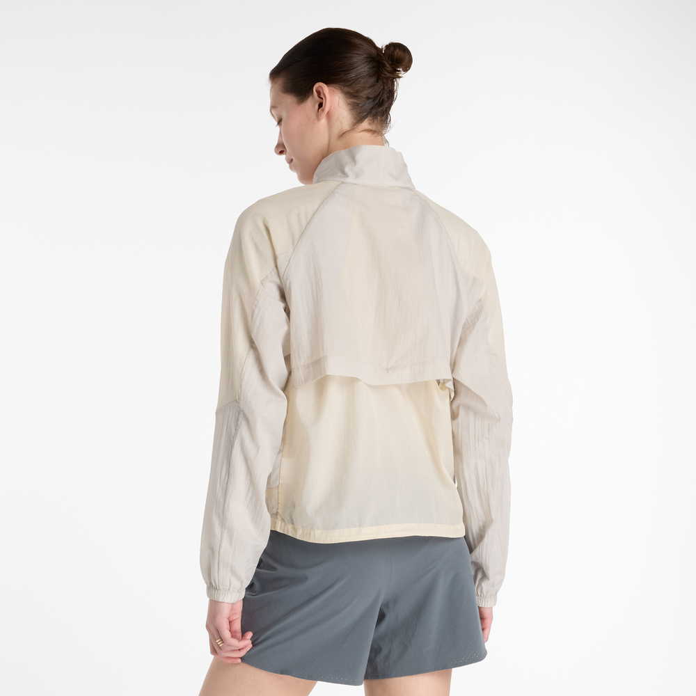 Női dzseki New Balance WO53206LIN – bézs