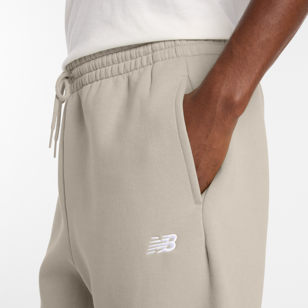 Férfi nadrág New Balance MP41503TWF – bézs
