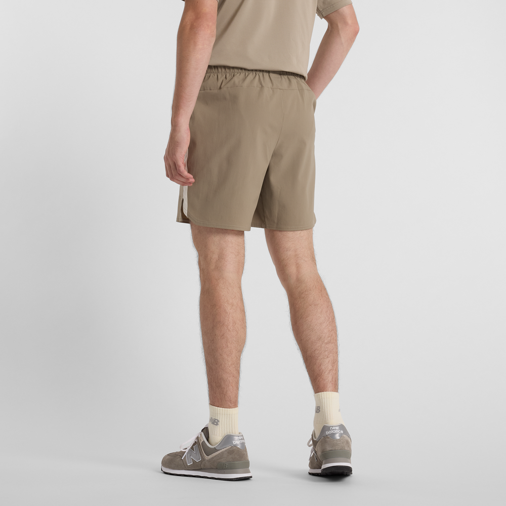 Férfi futónadrág New Balance MS41401ADS – bézs
