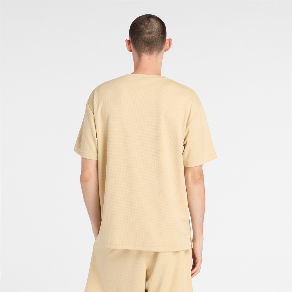 Férfi futópóló New Balance MT6100FRABC– sárga