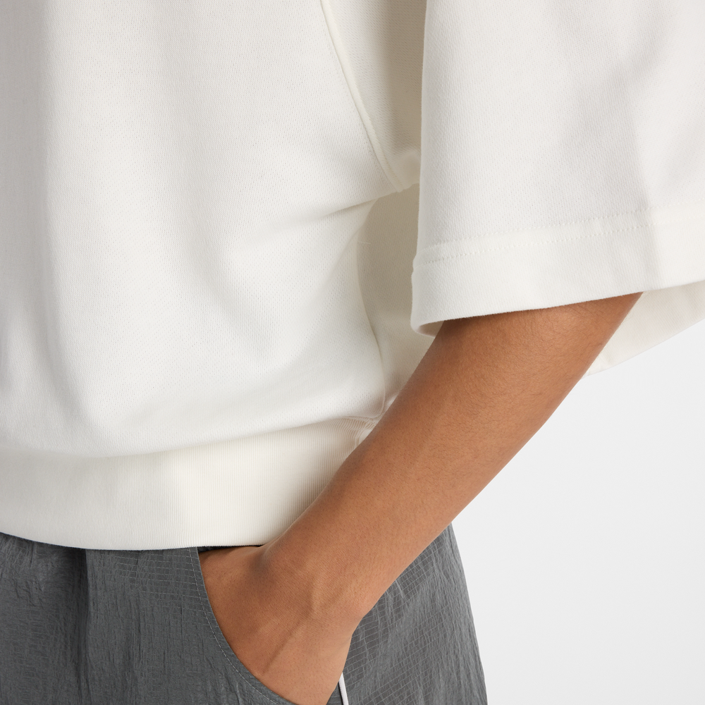 Női póló New Balance WT611044SST – fehér