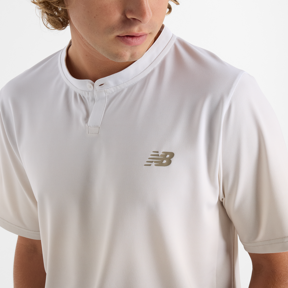 Férfi futópóló New Balance MT41406LIN – bézs