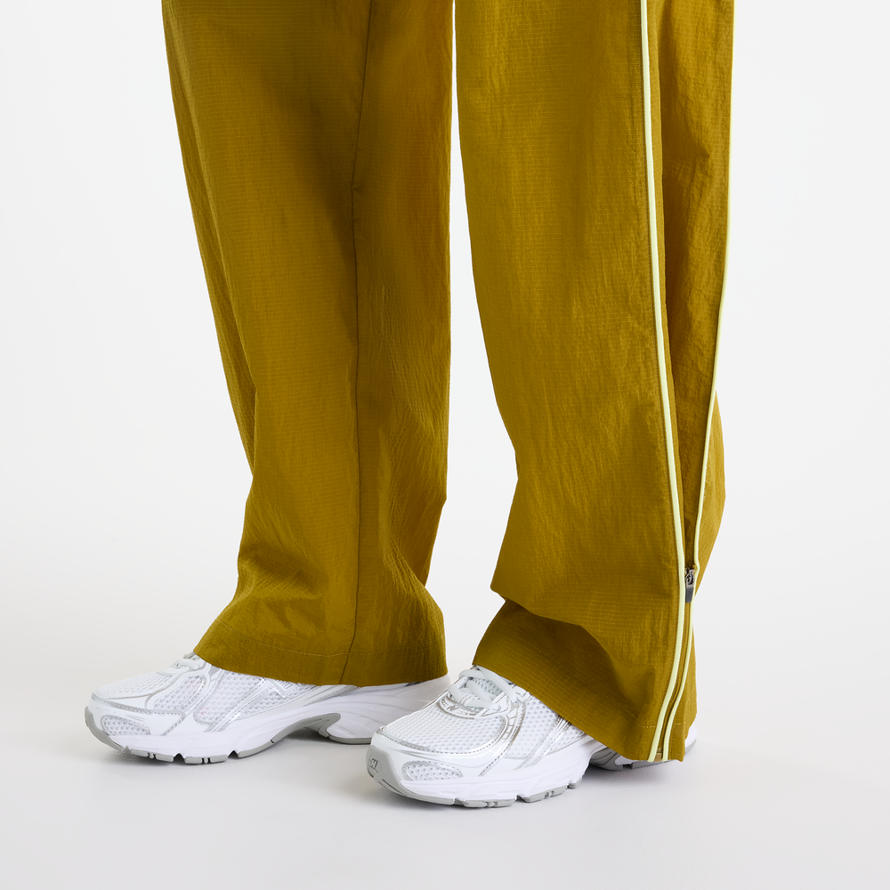Női nadrág New Balance Sport Legacy – sárga