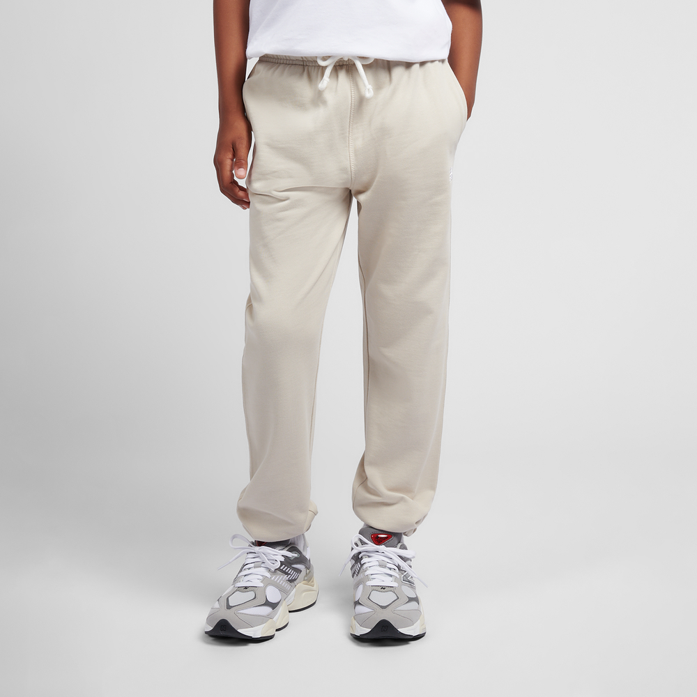Gyerek nadrágok New Balance LAKB0060TWF – bézs