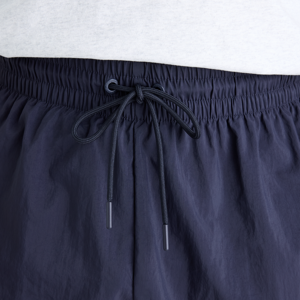 Férfi futónadrág New Balance Sport Legacy – lila