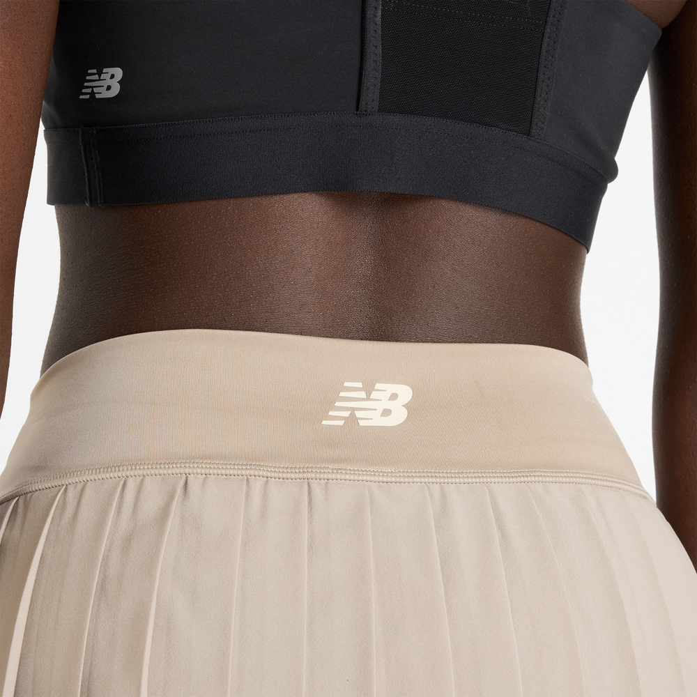Női szoknya New Balance WK51402ADS – bézs