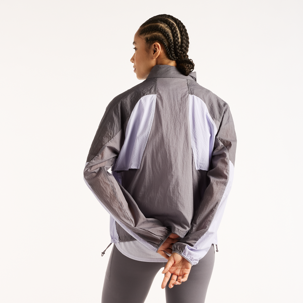 Sportdzseki New Balance Reflective RC – szürke