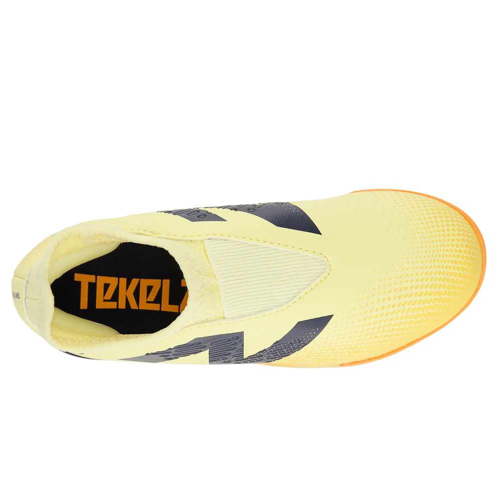 Gyermek turf cipő New Balance TEKELA V4+ MAGIQUE JNR FG SJT3TJ45 – sárga