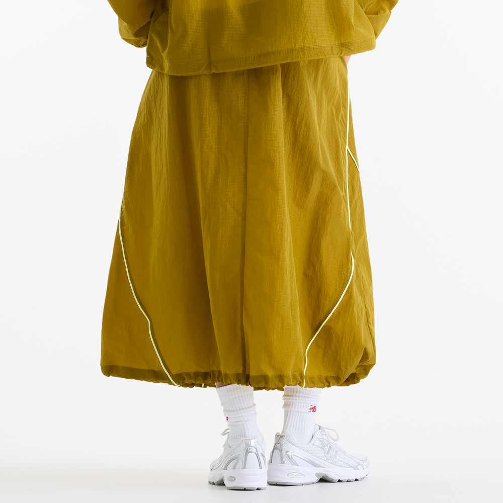 Női szoknya New Balance Sport Legacy – sárga