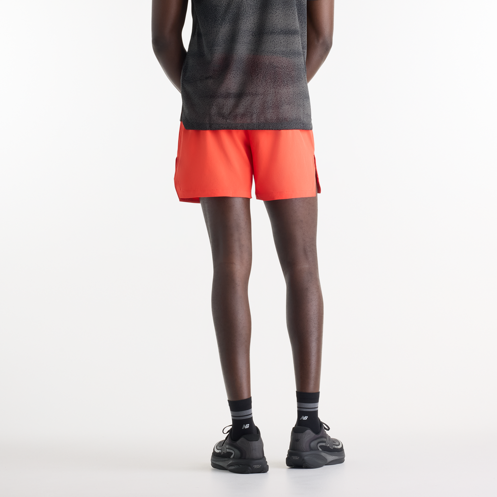 Férfi futónadrág New Balance RC Essential – narancssárga