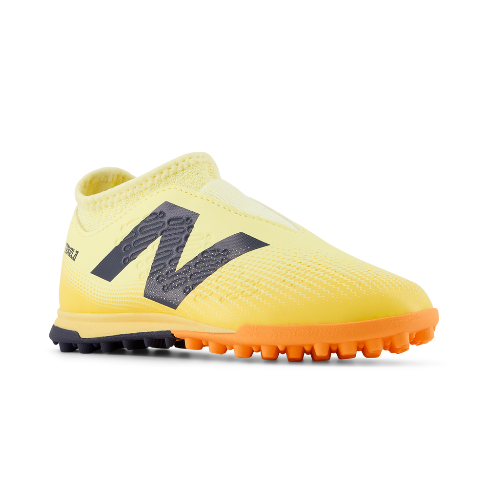 Gyermek turf cipő New Balance TEKELA V4+ MAGIQUE JNR FG SJT3TJ45 – sárga