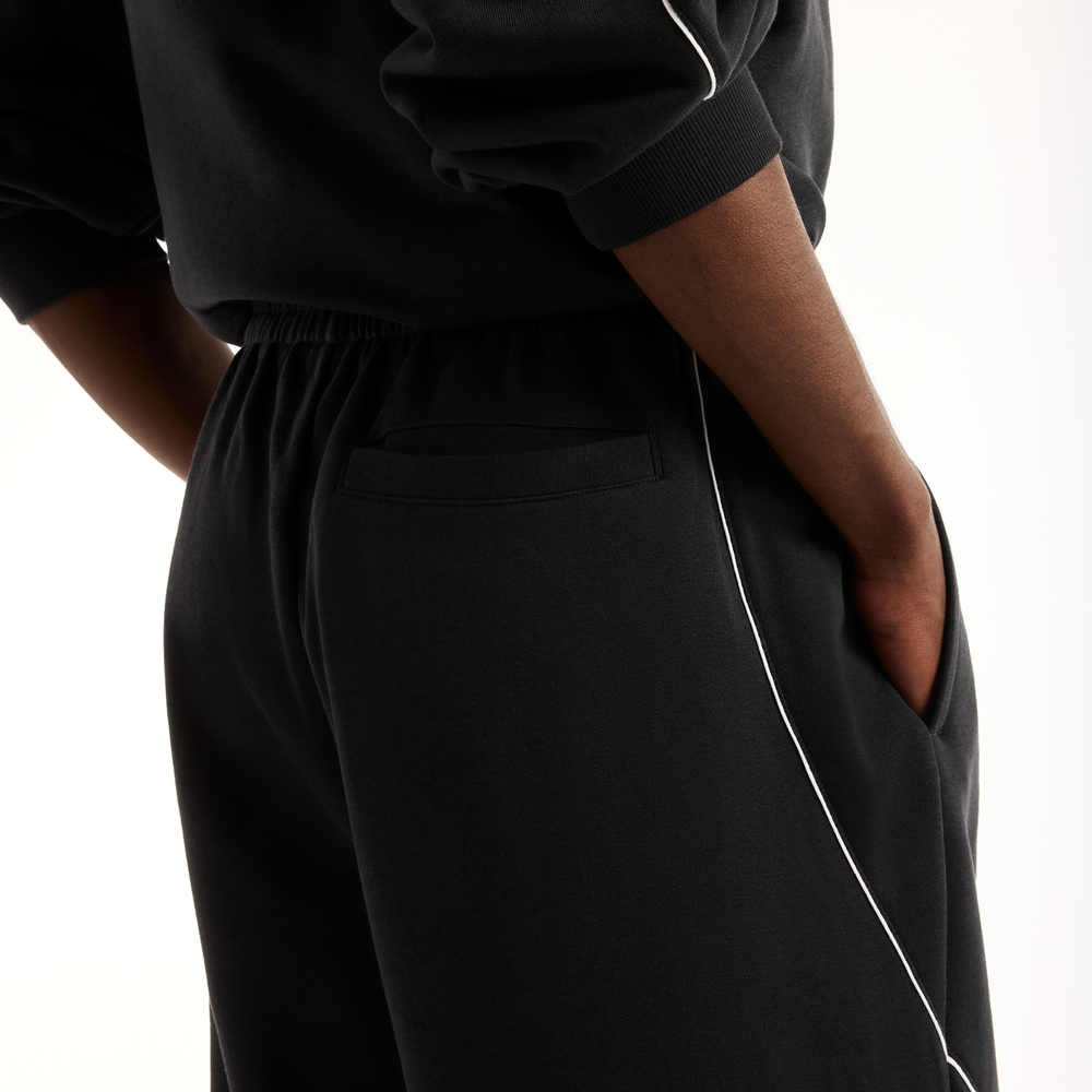 Férfi nadrág New Balance Trackside Pants – fekete