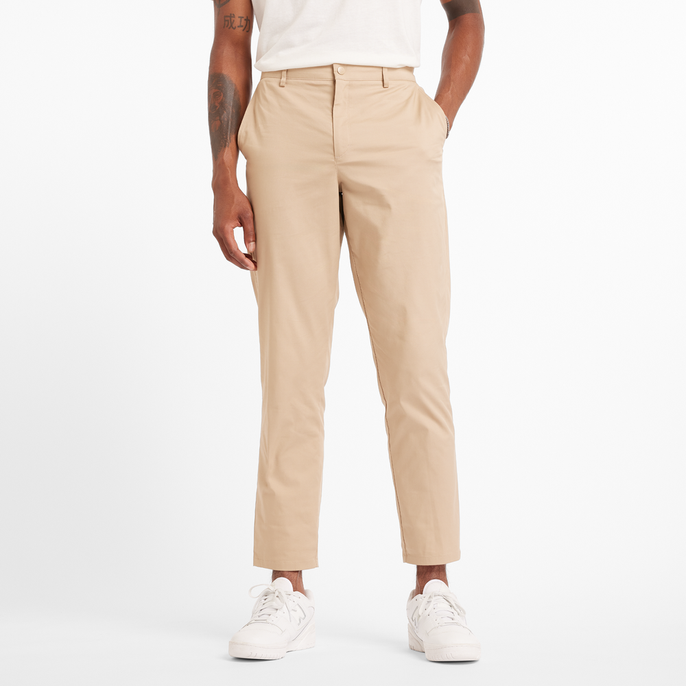Férfi nadrág New Balance MP43554SOT – bézs