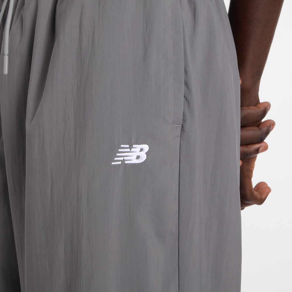 Férfi nadrág New Balance MB61R010CAS – szürke