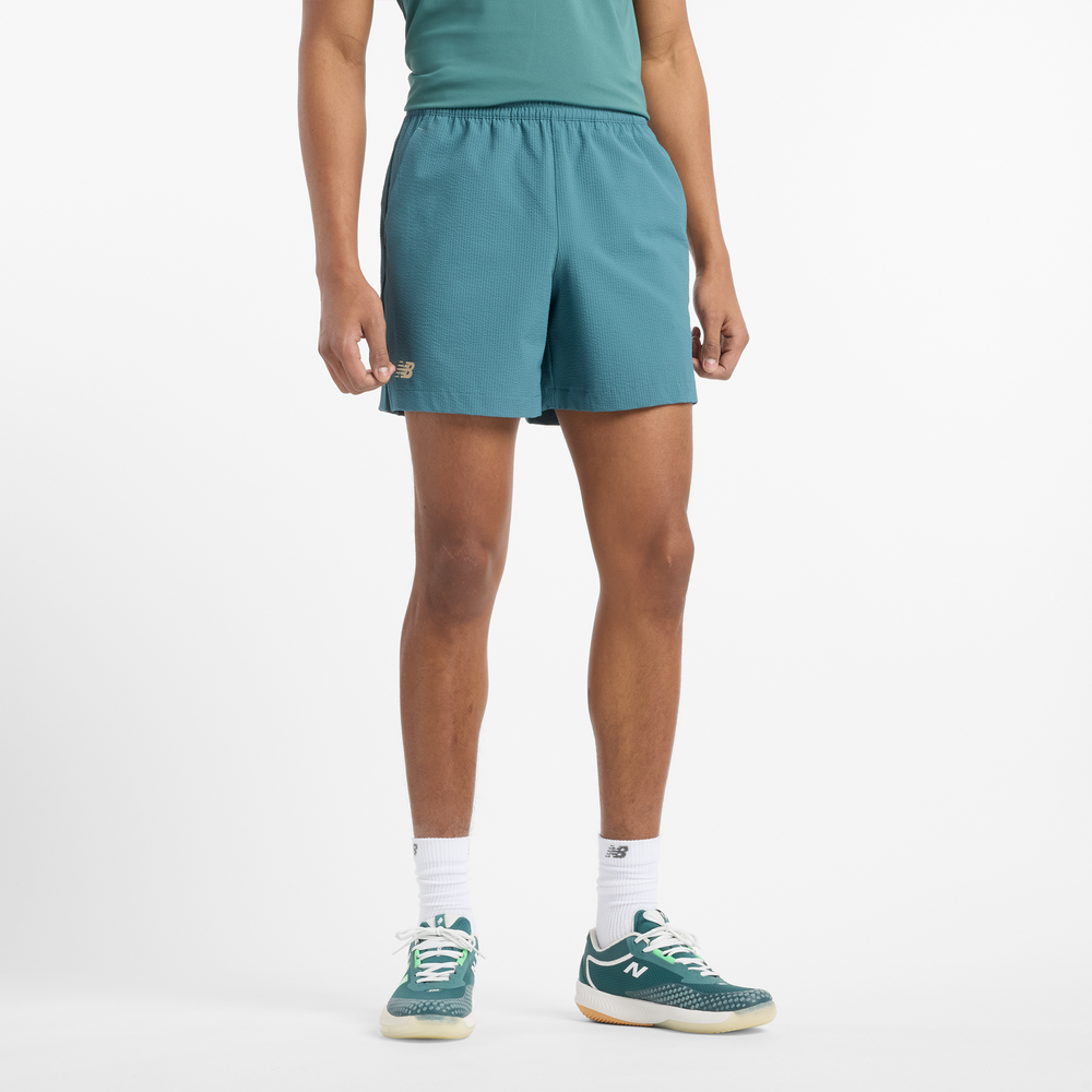 Férfi futónadrág New Balance MS51402NUS – kék