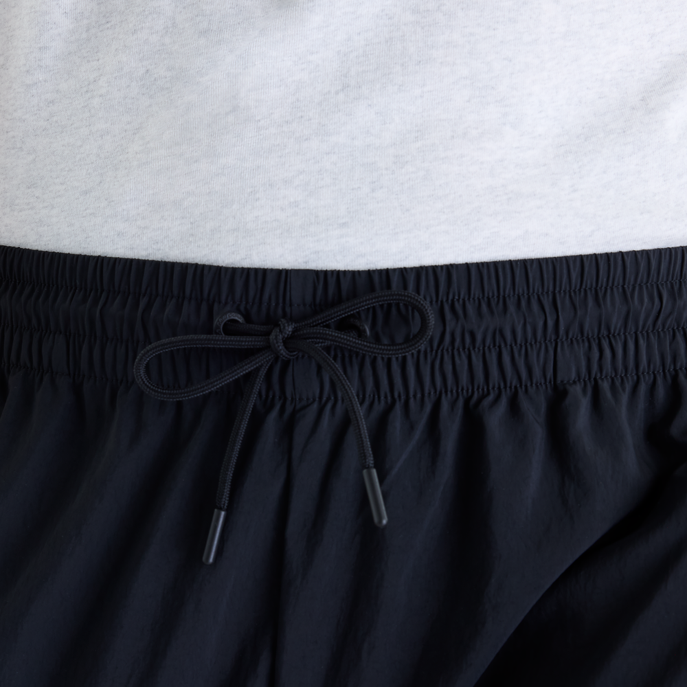 Férfi nadrág New Balance Sport Legacy – fekete