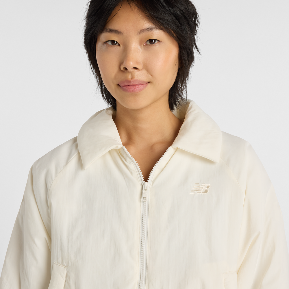 Női dzseki New Balance WJ61D8YXSST​ – bézs