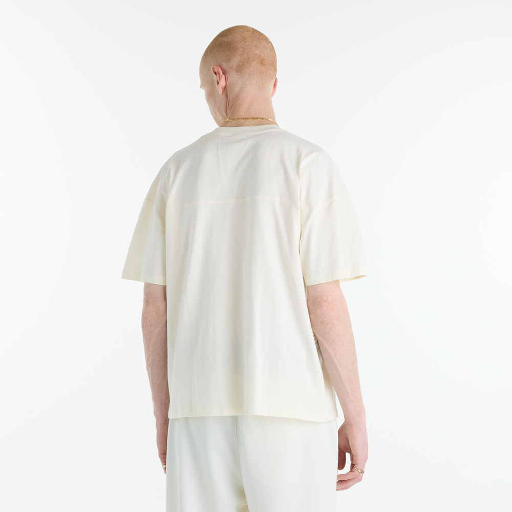 Férfi póló New Balance Sport Legacy – bézs