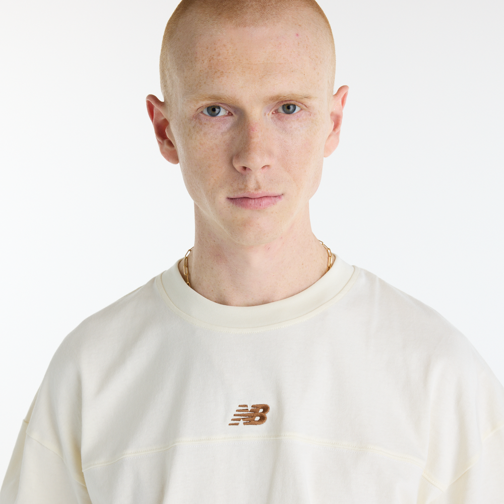 Férfi póló New Balance Sport Legacy – bézs