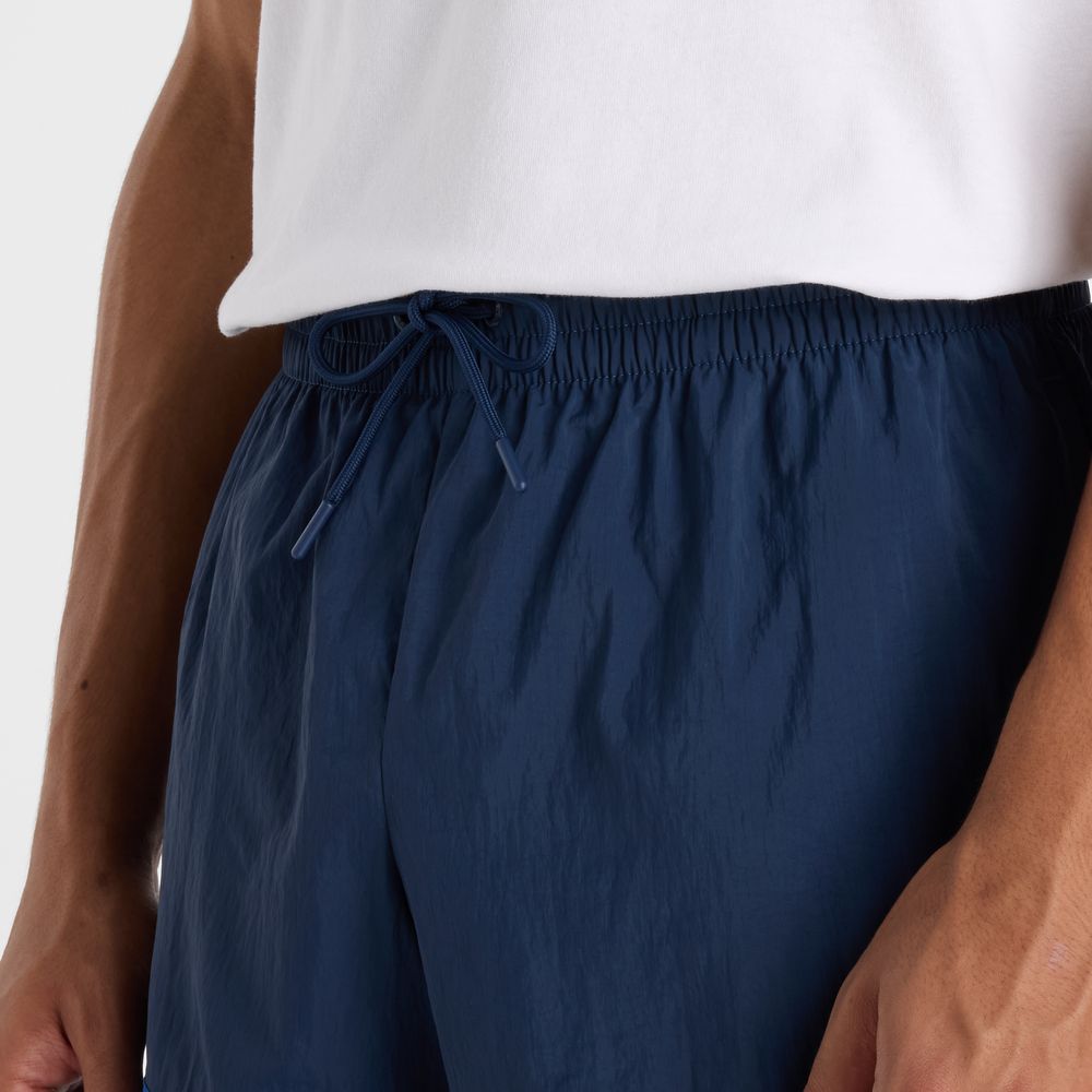 Férfi futónadrág New Balance MB6176MRNNY – sötétkék