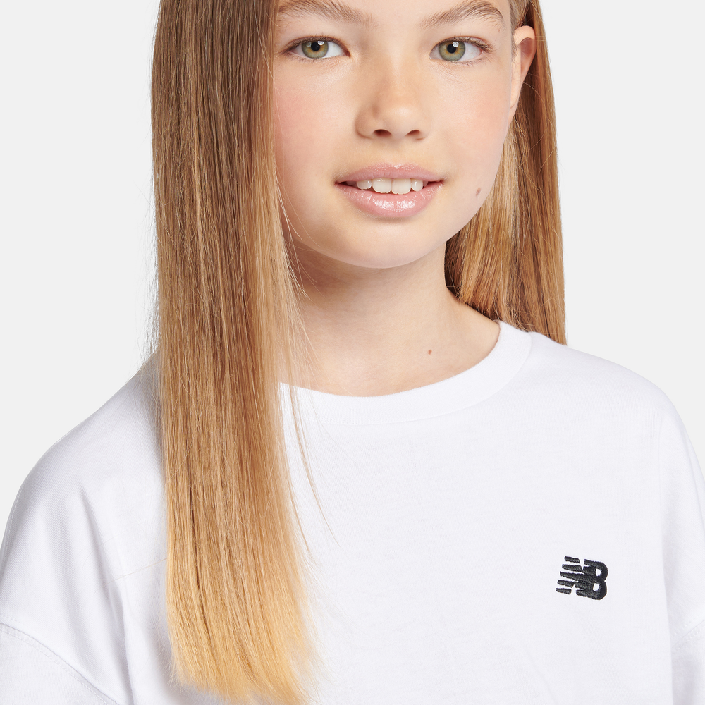 Gyerek póló New Balance LAKG0001BWE – fehér