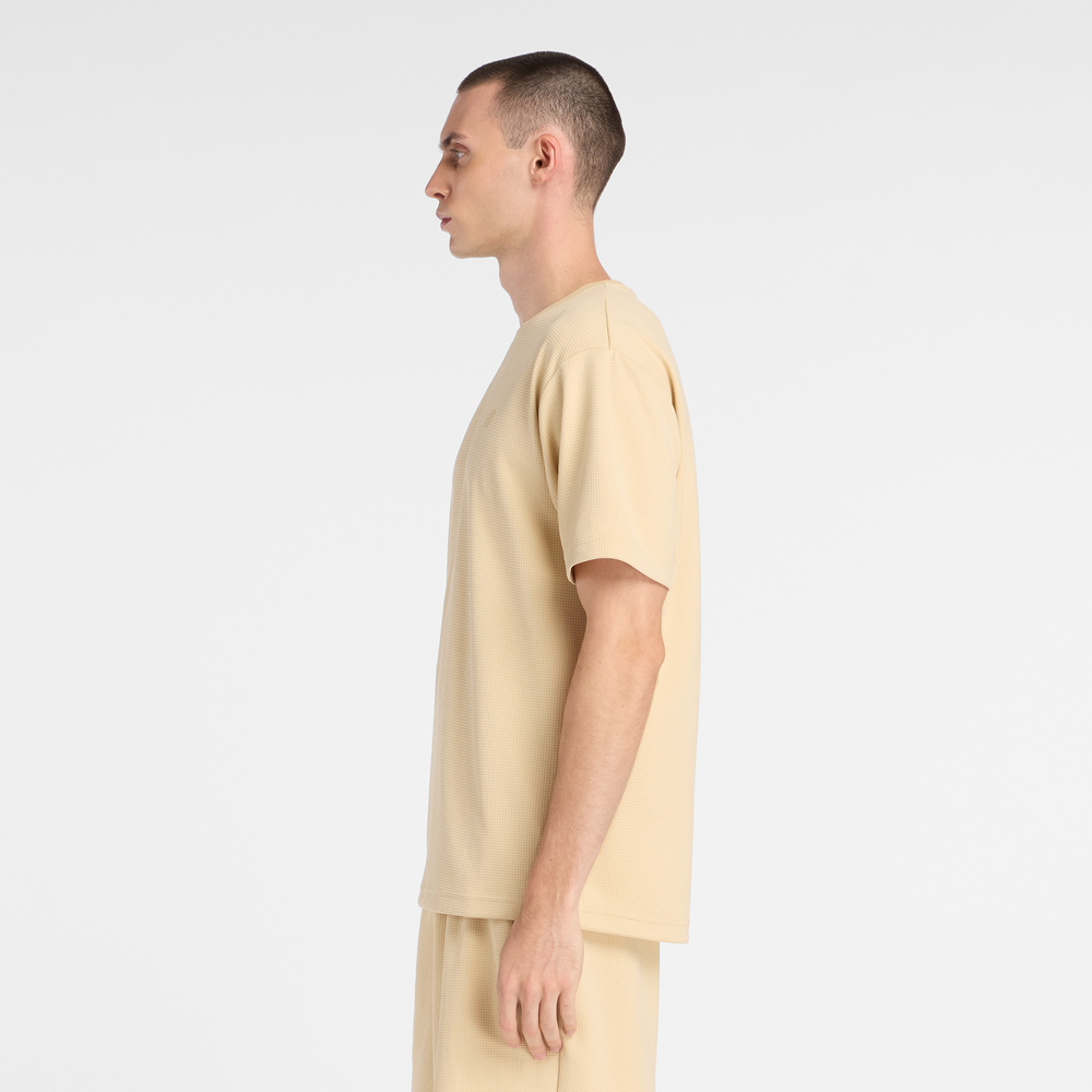 Férfi futópóló New Balance MT6100FRABC– sárga