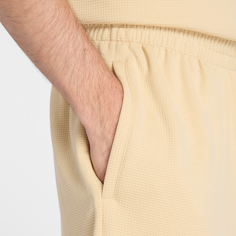 Férfi nadrág New Balance MB61V17CABC – sárga