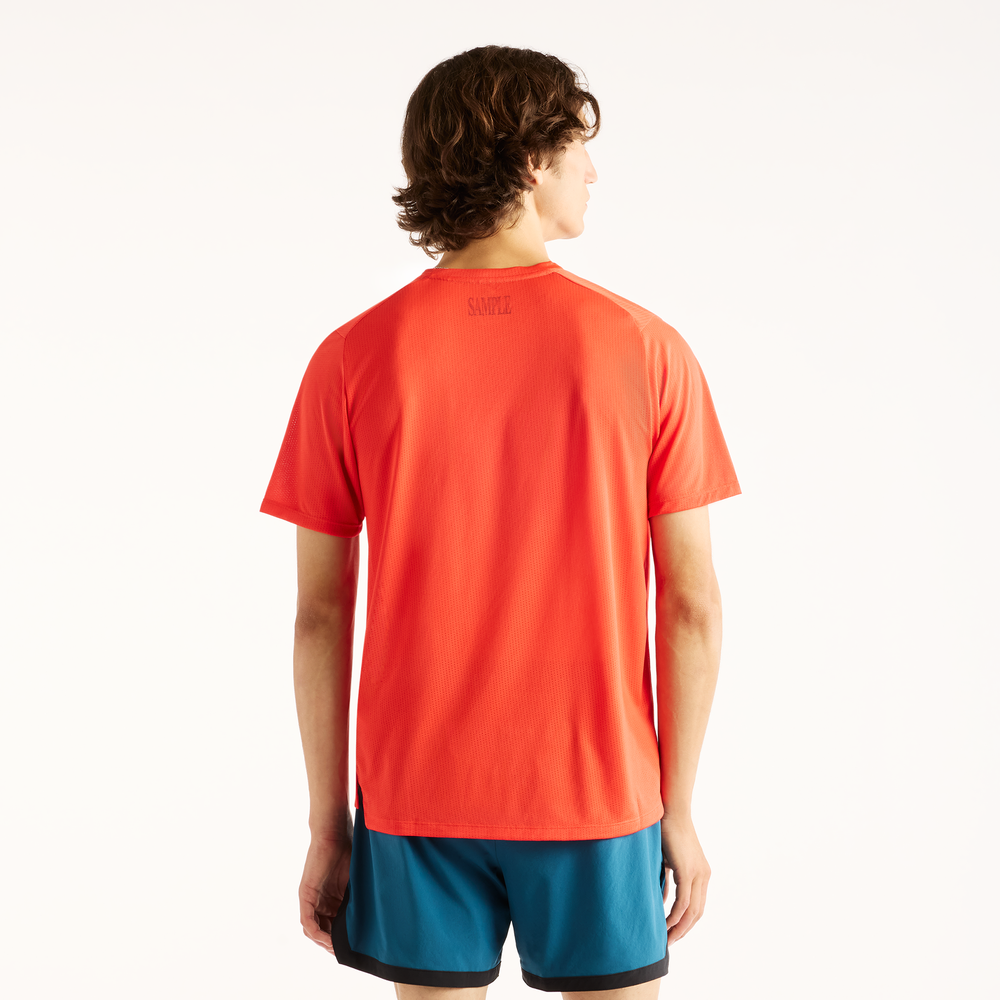 Férfi futópóló New Balance RC Essential – narancssárga