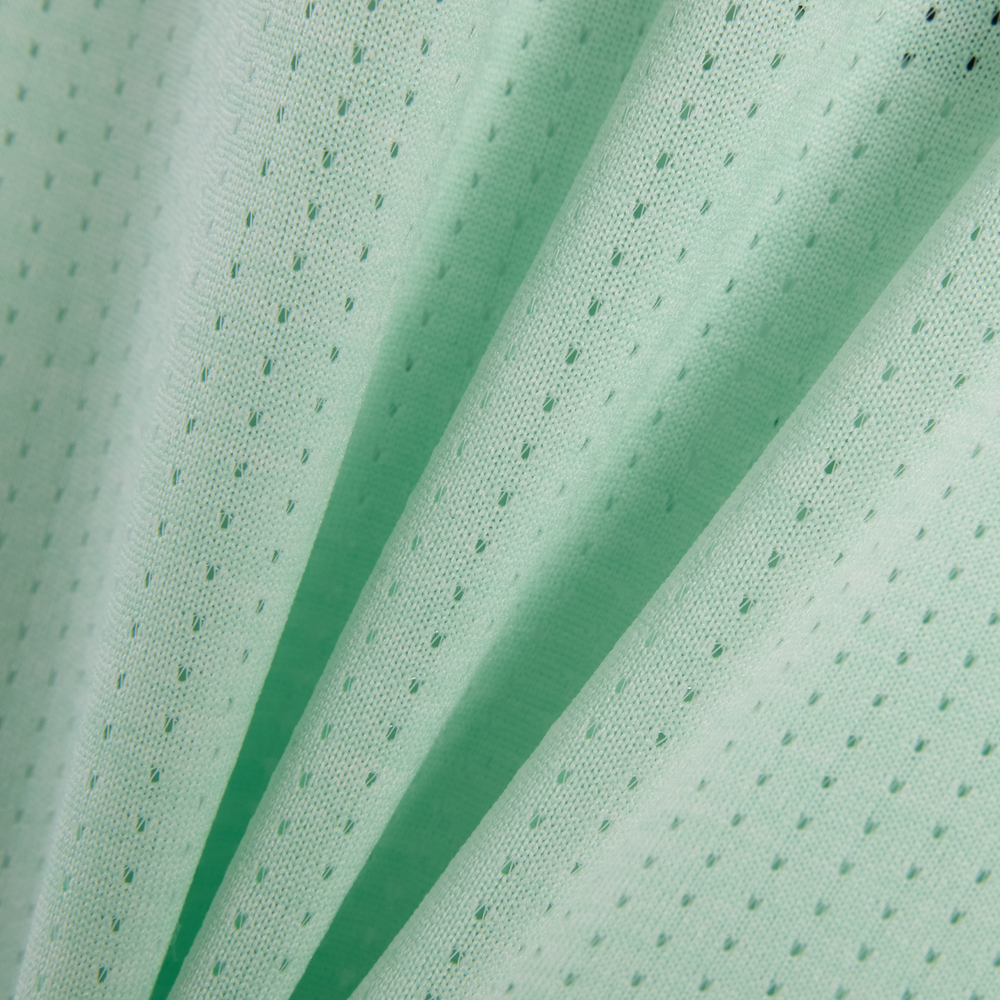 Férfi futópóló New Balance MT41253AB8 – menta