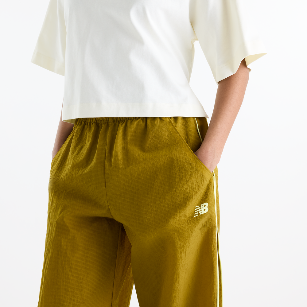 Női nadrág New Balance Sport Legacy – sárga