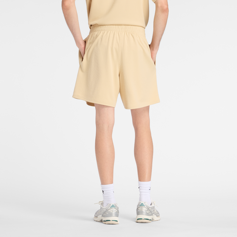 Férfi nadrág New Balance MB61V17CABC – sárga