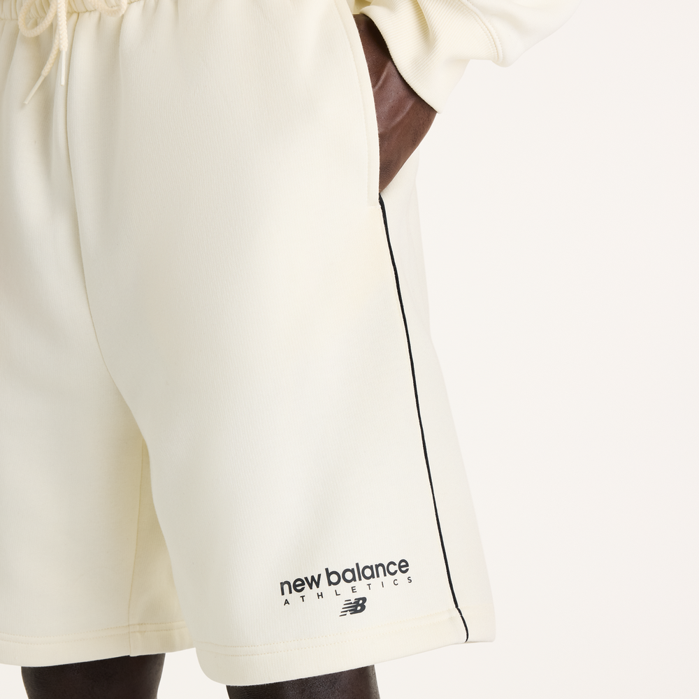 Férfi nadrág New Balance Sport Linear Graphic – bézs