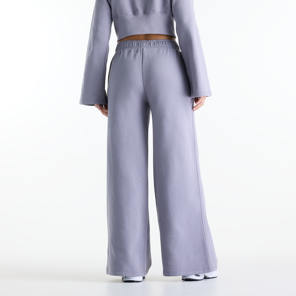 Női nadrág New Balance Brushed Coastal – lila