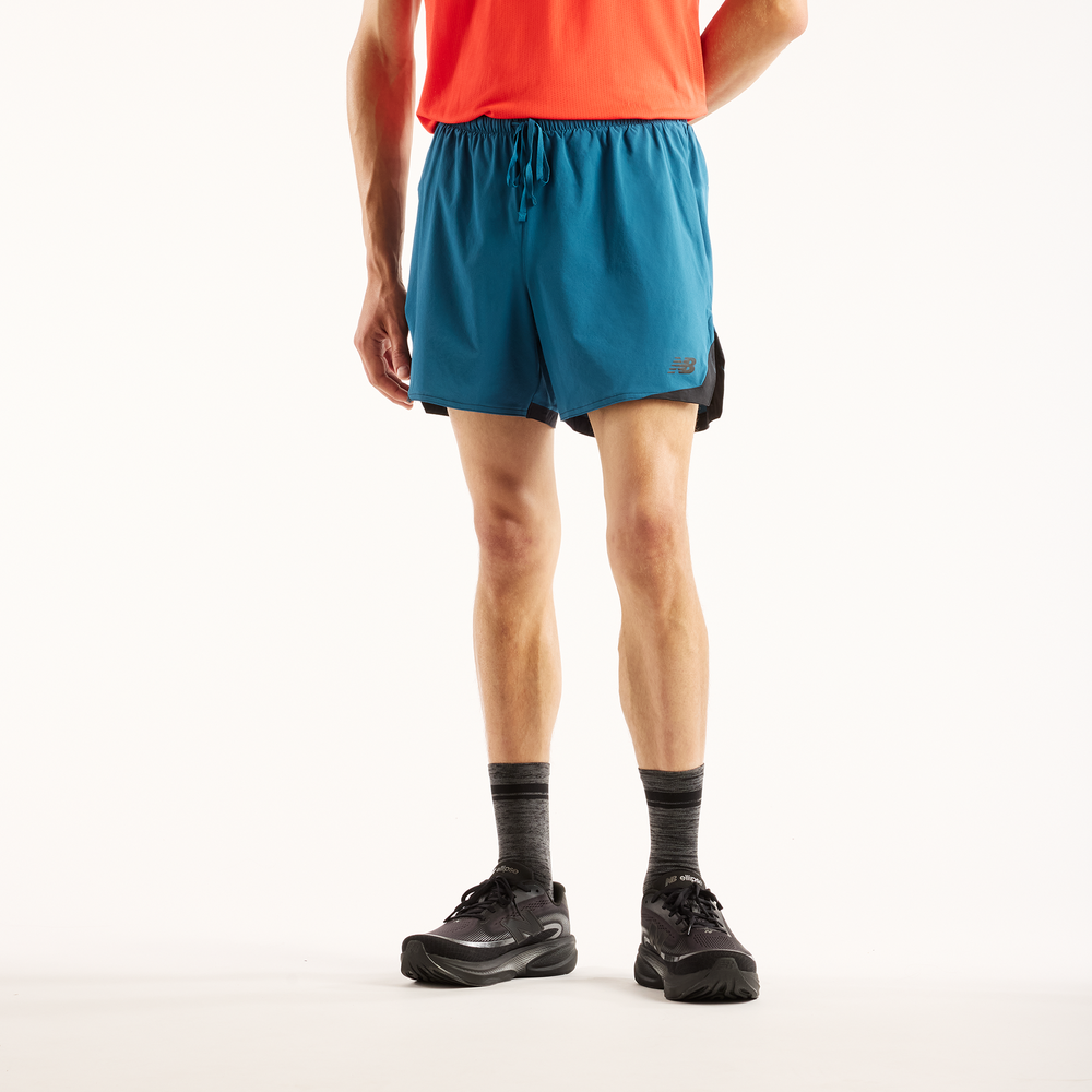 Férfi futónadrág New Balance MB6180TASTS – kék