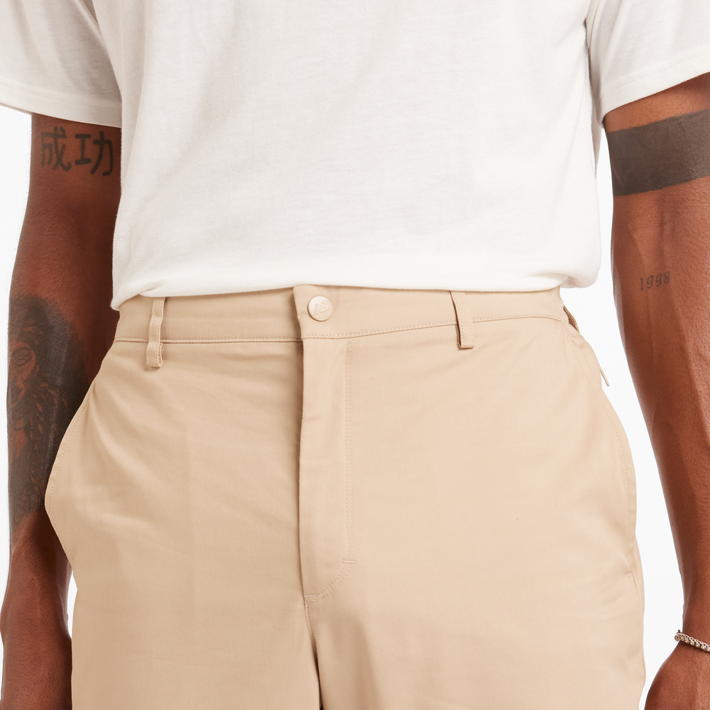 Férfi nadrág New Balance MP43554SOT – bézs