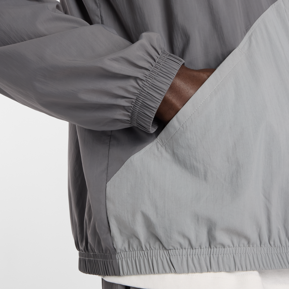 Férfi kabát New Balance MJ61J73YCAS – szürke