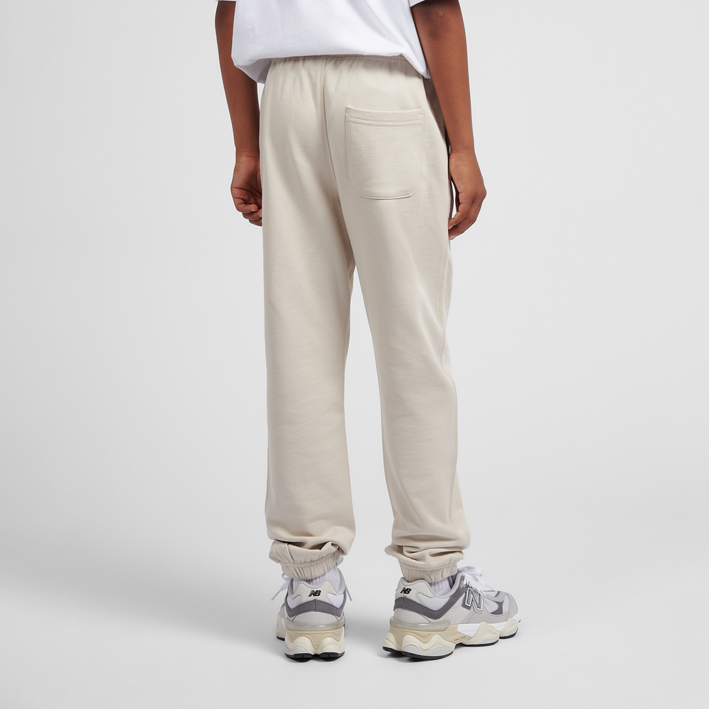 Gyerek nadrágok New Balance LAKB0060TWF – bézs