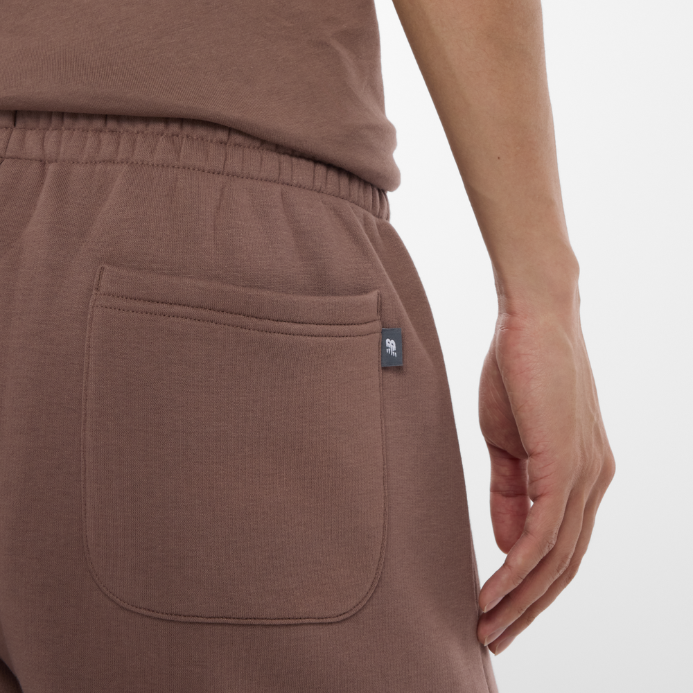 Férfi nadrág New Balance MP53508EAS – barna