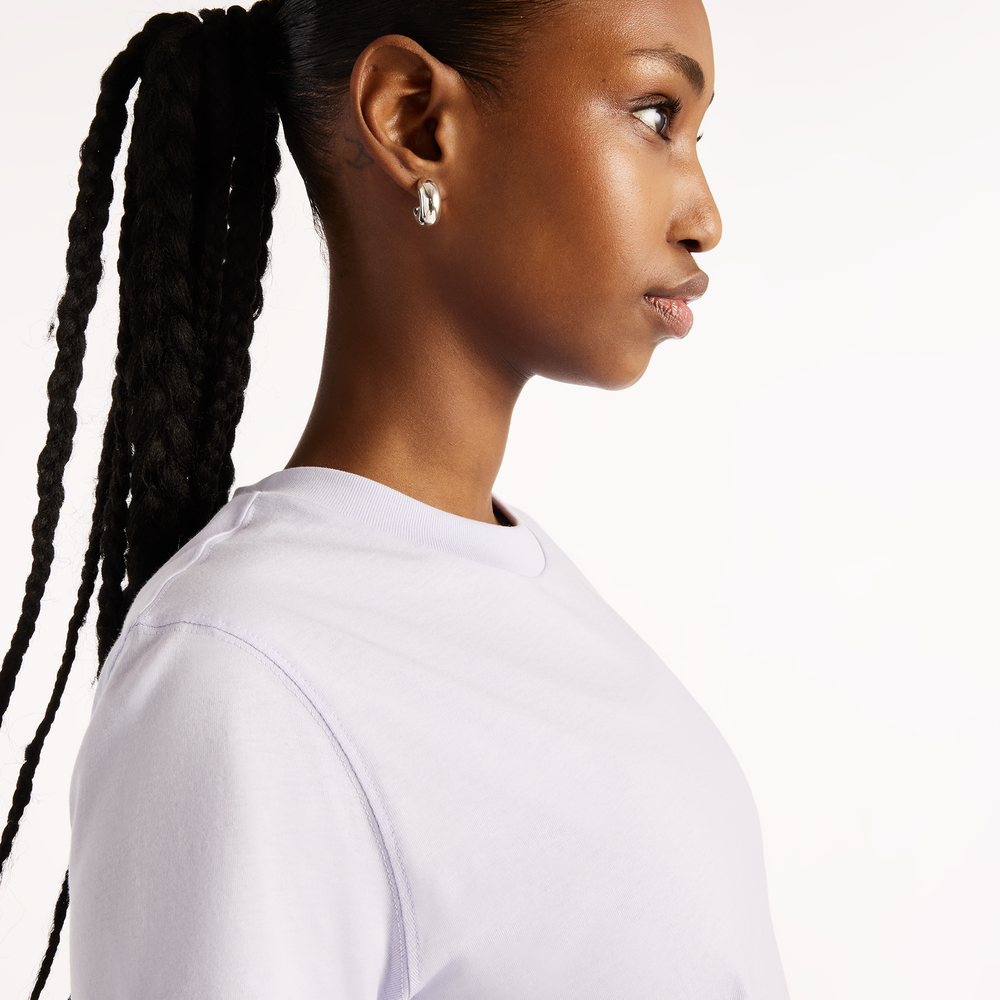 Női póló New Balance Sport Essentials – lila