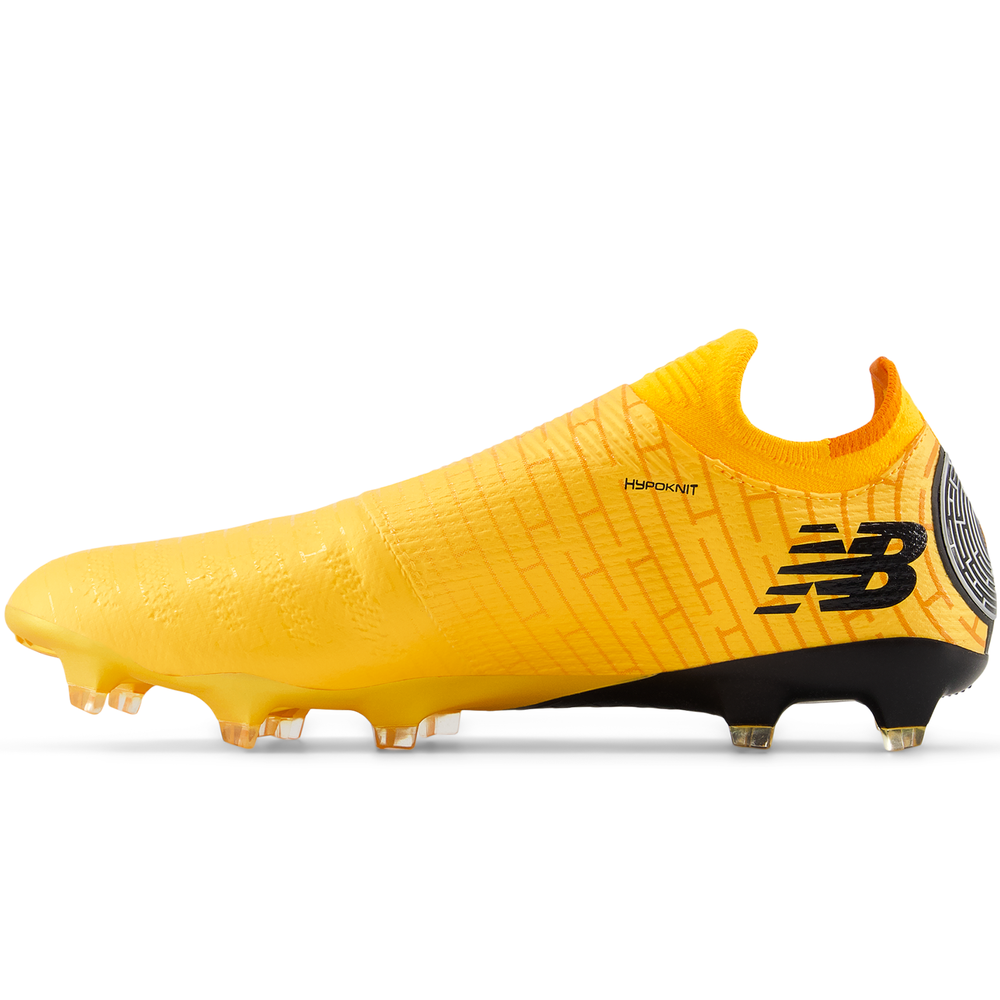 Férfi focicipő New Balance FURON PRO FG V7+ SF1FZ75 – sárga